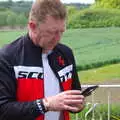 Gaz checks his phone, The BSCC Bike Ride 2019, Coggeshall, Essex - 11th May 2019