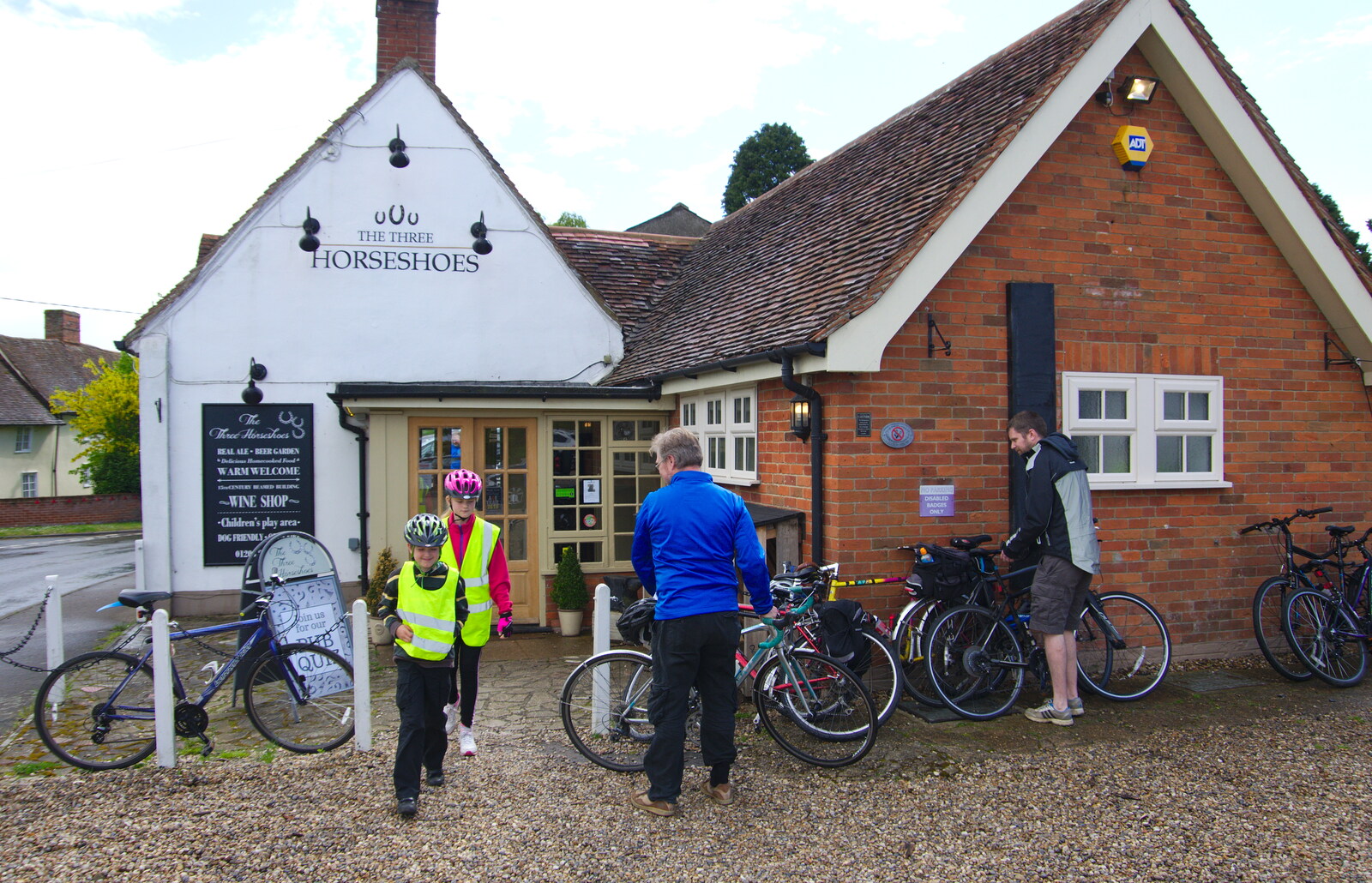 The BSCC Bike Ride 2019, Coggeshall, Essex - 11th May 2019: Fred comes out of the pub
