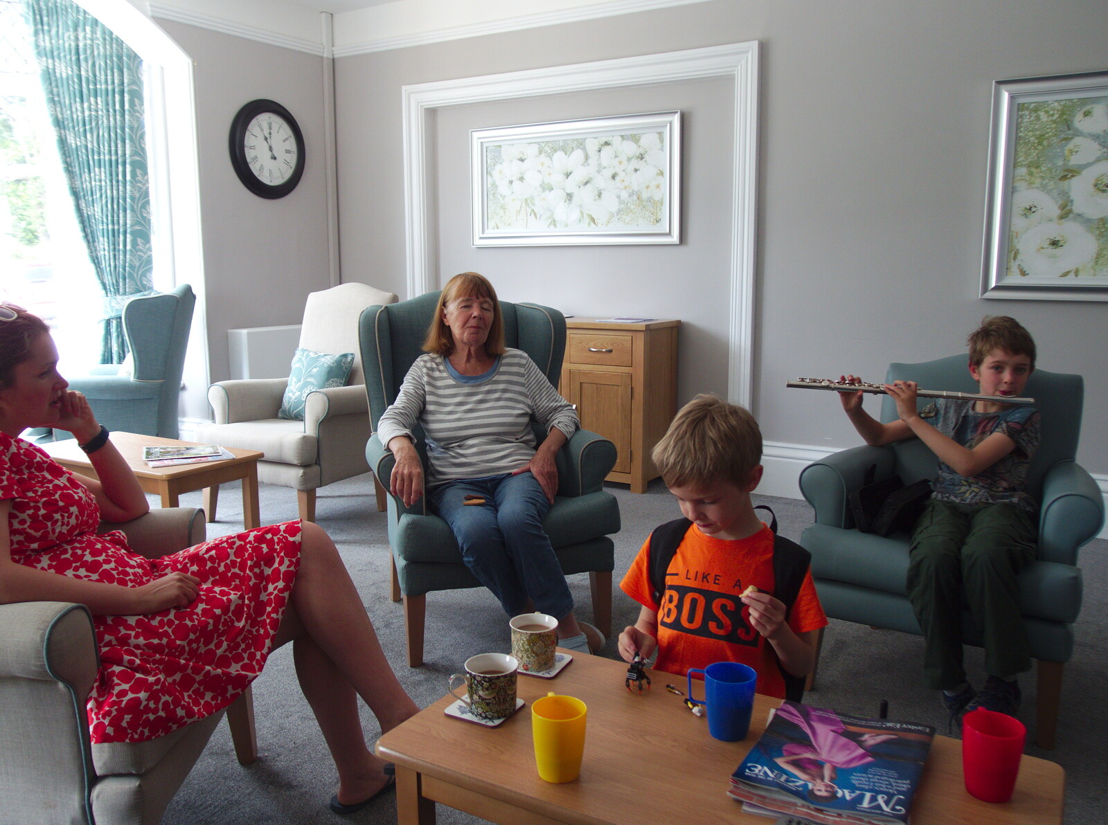 Chagford Lido and a Trip to Parke, Bovey Tracey, Devon - 25th May 2019: Fred plays some flute for Grandma J