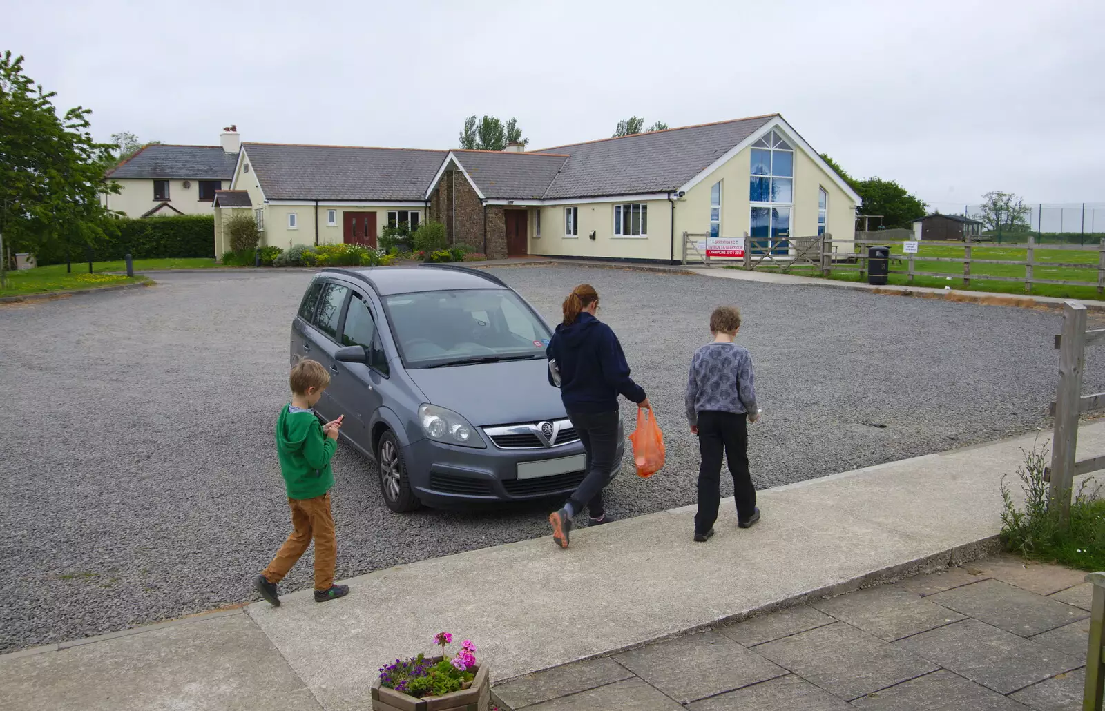 Isobel hauls the shop booty to the car, from The Tom Cobley and a Return to Haytor, Bovey Tracey, Devon - 27th May 2019