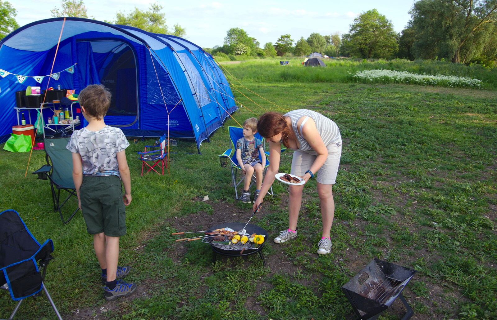 Isobel does some barbequeing from Camping at Three Rivers, Geldeston, Norfolk - 1st June 2019