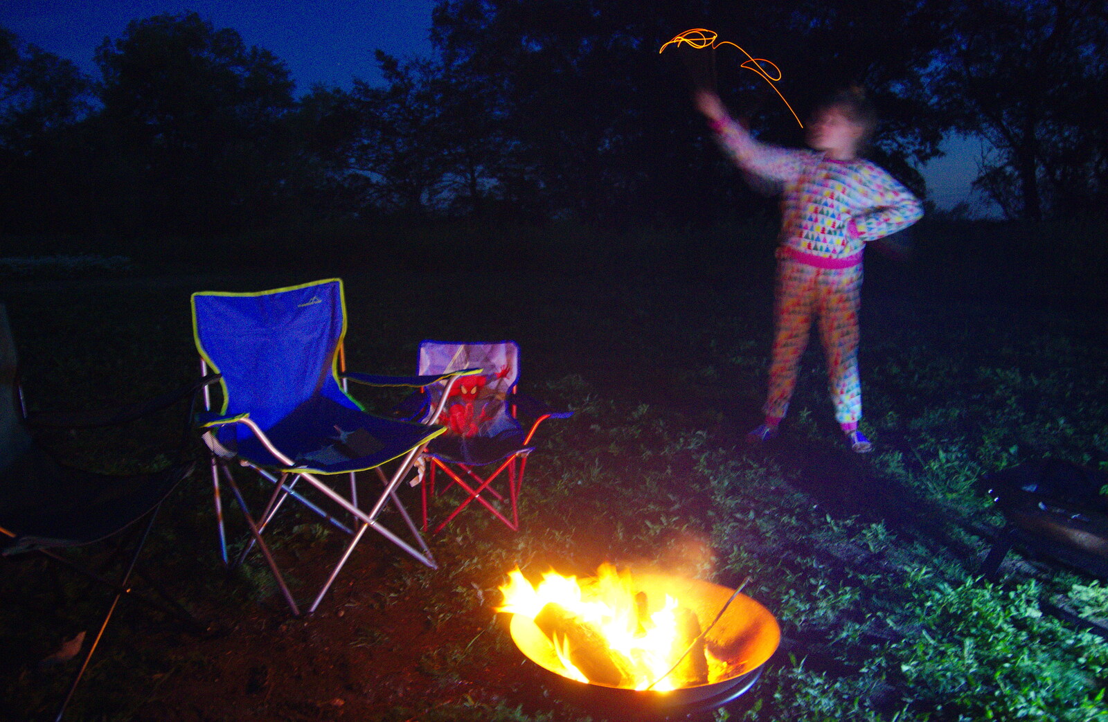 Lydia waves a fiery stick around in the dark from Camping at Three Rivers, Geldeston, Norfolk - 1st June 2019