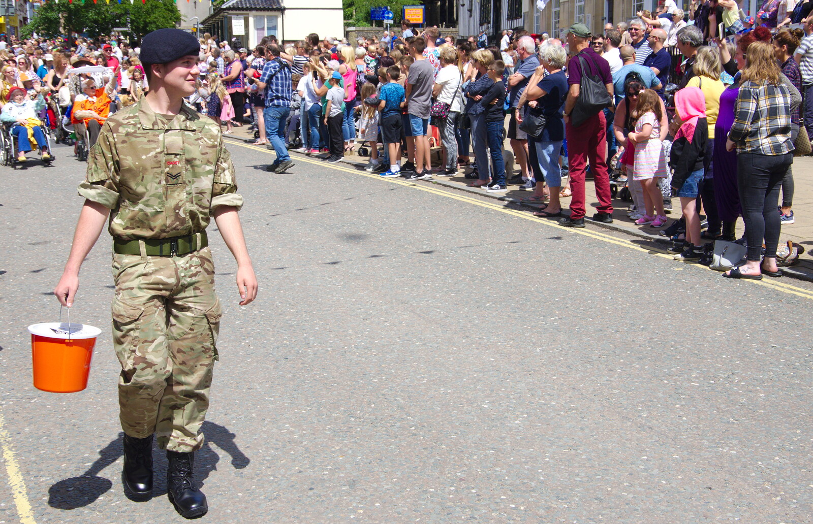 An army cadet with a collecting bucket from The Diss Carnival 2019, Diss, Norfolk - 9th June 2019