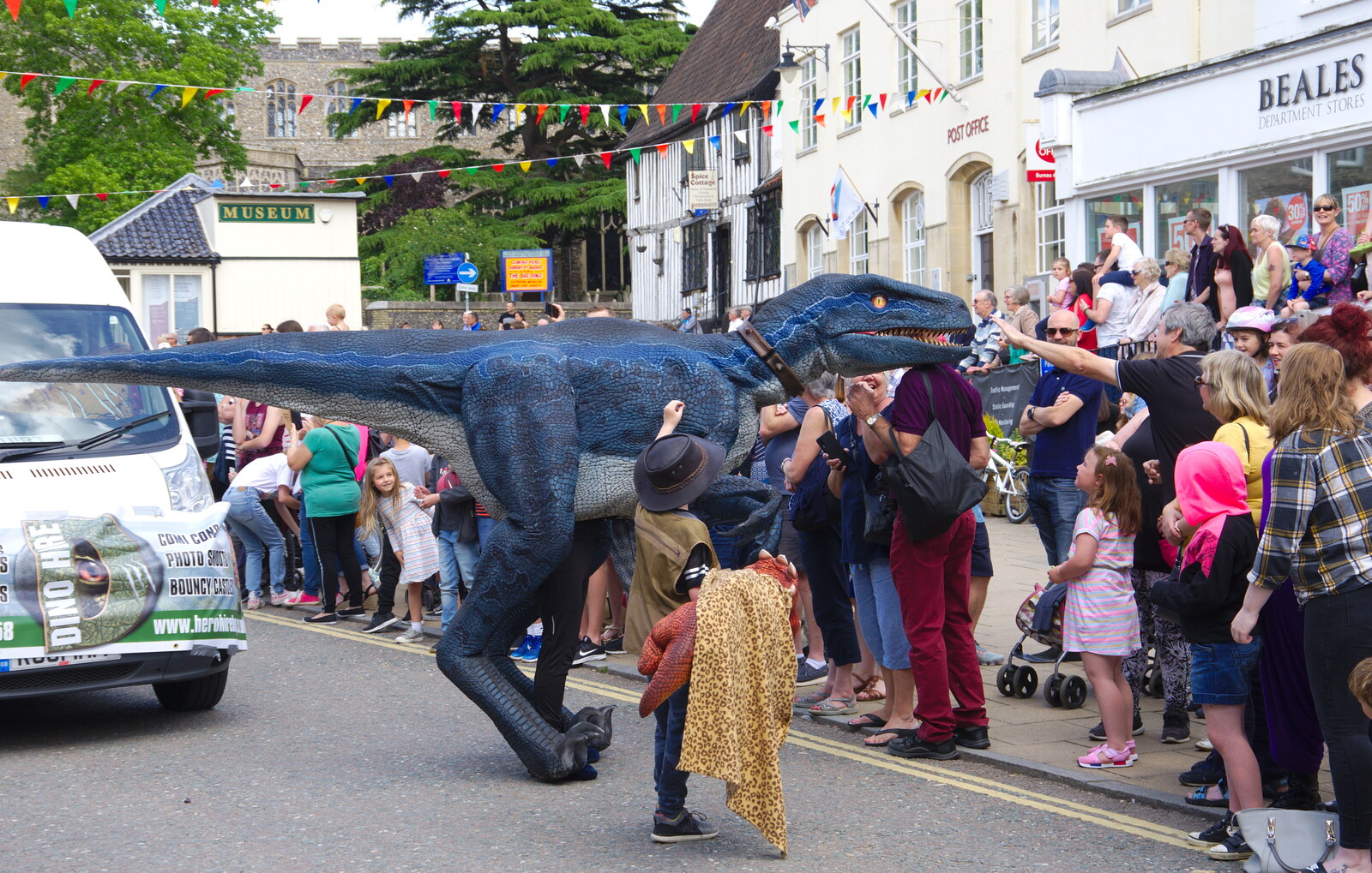 A quite-convincing dinosaur works the crowds from The Diss Carnival 2019, Diss, Norfolk - 9th June 2019