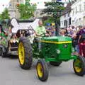 A John Deere tractor from Flax Farm trundles past, The Diss Carnival 2019, Diss, Norfolk - 9th June 2019