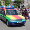 A funky rainbow-covered funeral car drives past, The Diss Carnival 2019, Diss, Norfolk - 9th June 2019