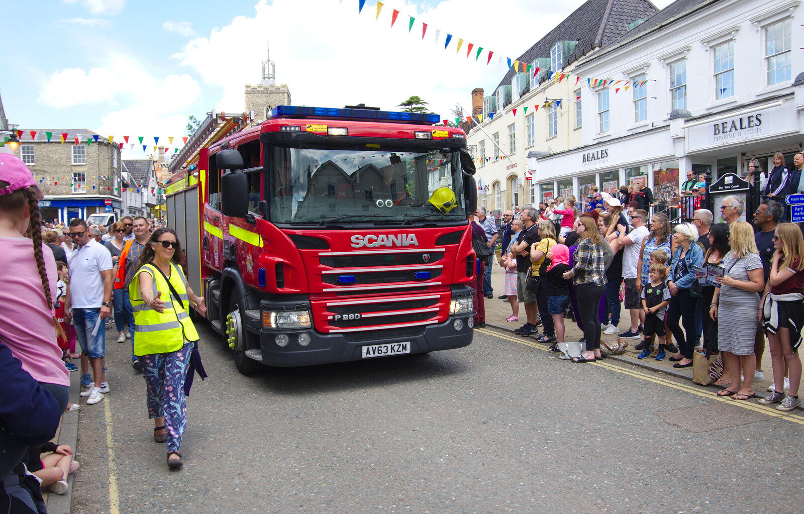 A fireengine makes a lot of noise as it drives by from The Diss Carnival 2019, Diss, Norfolk - 9th June 2019