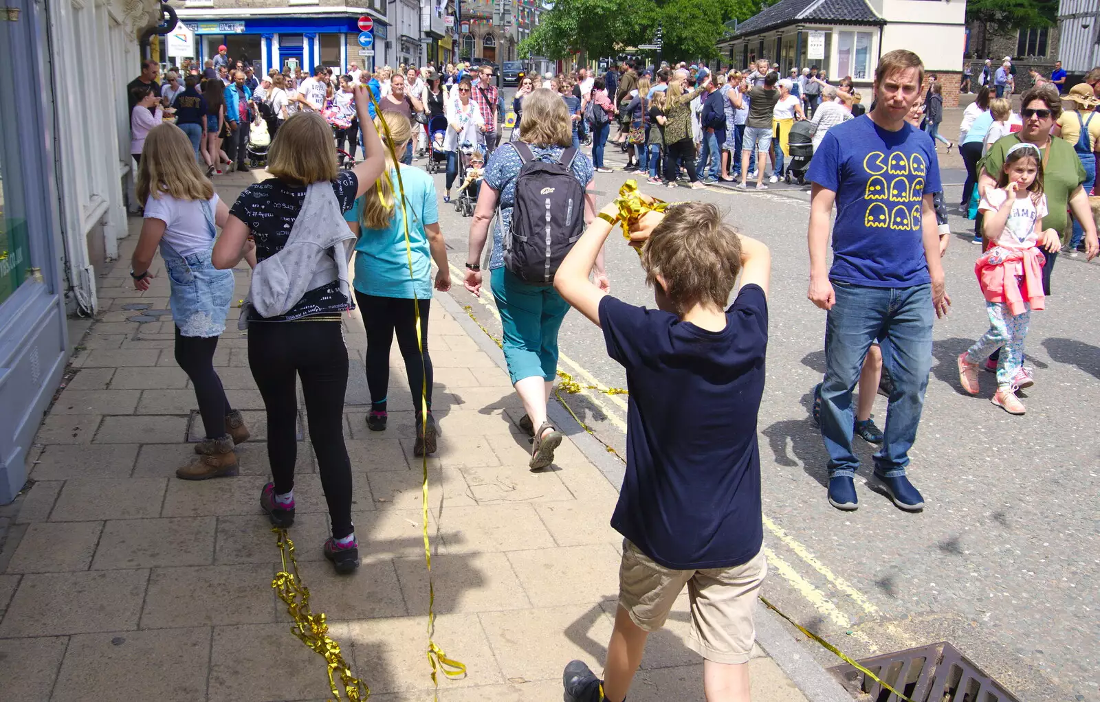 The girls trail golden ribbon around town, from The Diss Carnival 2019, Diss, Norfolk - 9th June 2019