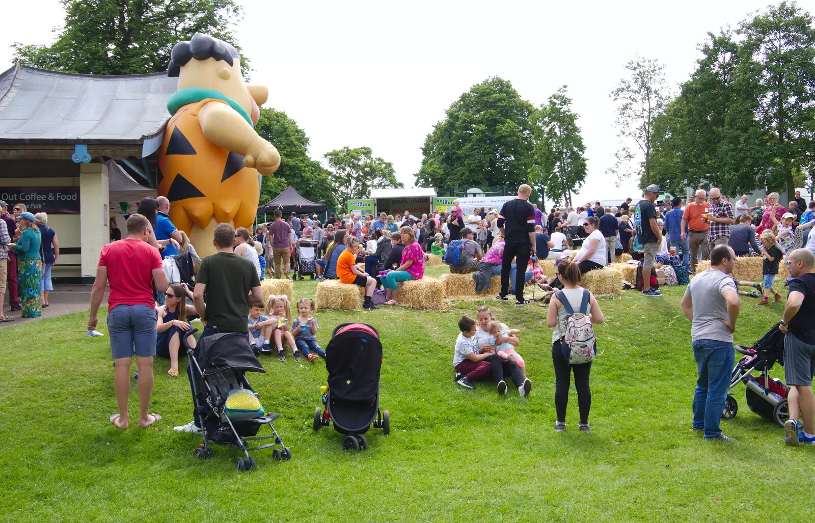 A giant Fred Flintstone floats around, from The Diss Carnival 2019, Diss, Norfolk - 9th June 2019