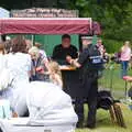 Andy Sausage serves a rozzer, The Diss Carnival 2019, Diss, Norfolk - 9th June 2019