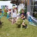 Fred rides a small triceratops, The Diss Carnival 2019, Diss, Norfolk - 9th June 2019