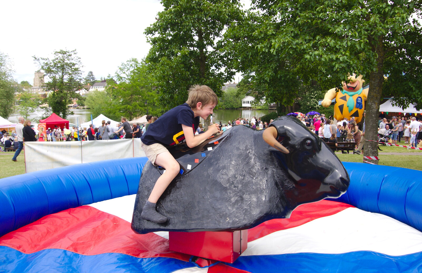 Fred desperately tries to cling on to a rodeo bull from The Diss Carnival 2019, Diss, Norfolk - 9th June 2019