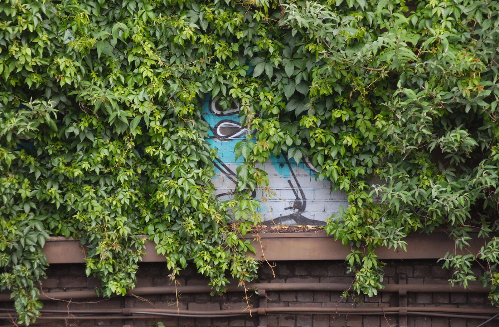 Some graffiti has been almost totally covered from A High-Pressure Watermain and some Graffiti, Eye and London - 11th June 2019