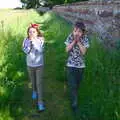 Sophie and Fred learn the grass-blade trumpet thing, Cliff House Camping, Dunwich, Suffolk - 15th June 2019