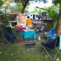 Isobel helps set up the barbeque area, Cliff House Camping, Dunwich, Suffolk - 15th June 2019