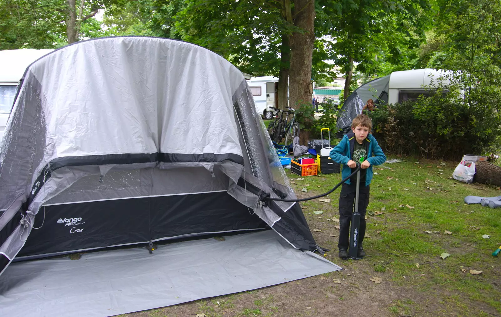 The next day, Fred helps to deflate the tent, from Cliff House Camping, Dunwich, Suffolk - 15th June 2019