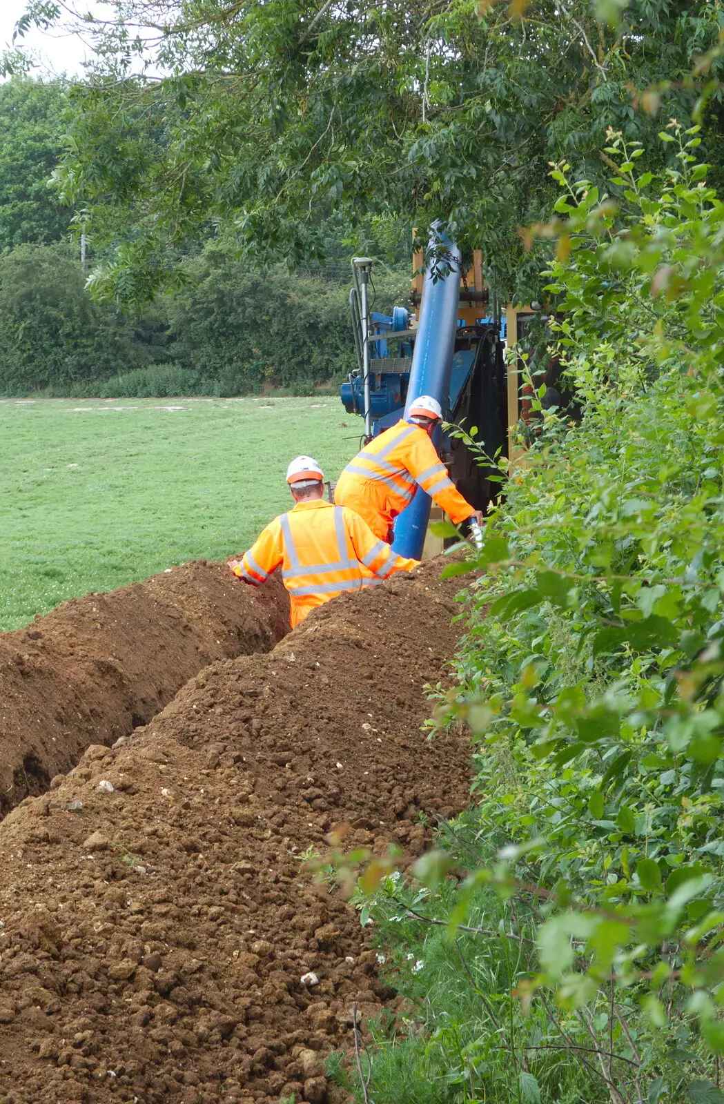 The pipe is checked as it's buried, from The BSCC at North Lopham, and the GSB Mayor's Parade, Eye, Suffolk - 23rd June 2019