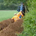 The pipe is checked as it's buried, The BSCC at North Lopham, and the GSB Mayor's Parade, Eye, Suffolk - 23rd June 2019