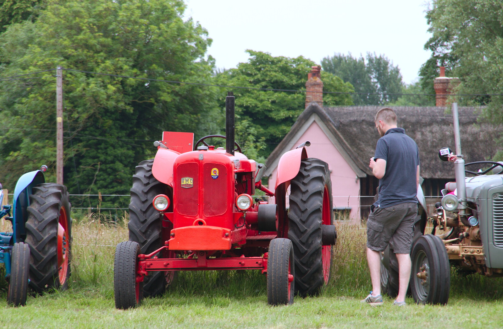 The Boy Phil inspects tractors from A Hog Roast on Little Green, Thrandeston, Suffolk - 23rd June 2019