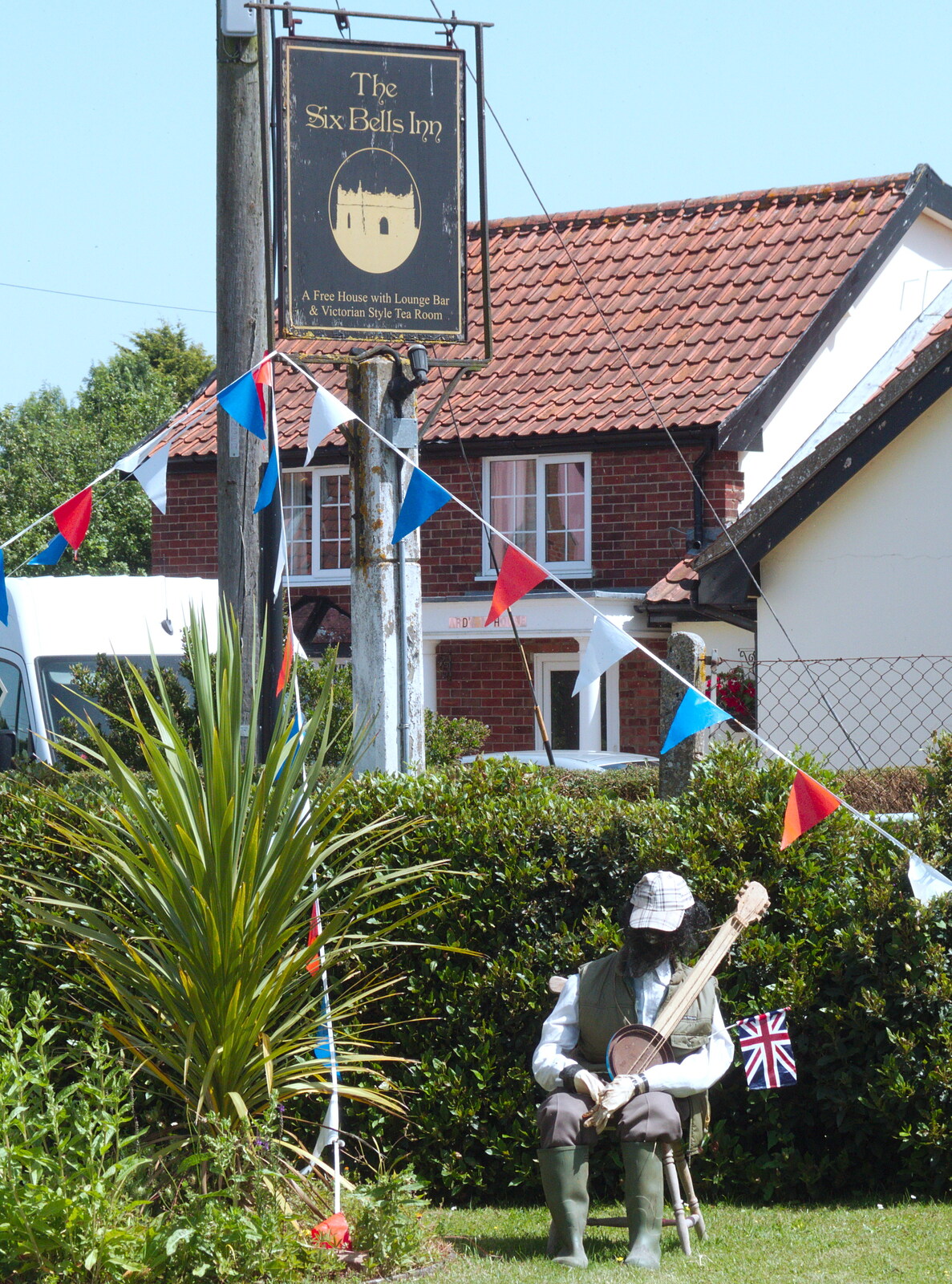 There's a comedy scarecrow with a banjo from GSB and the Gislingham Fete, Suffolk - 29th June 2019