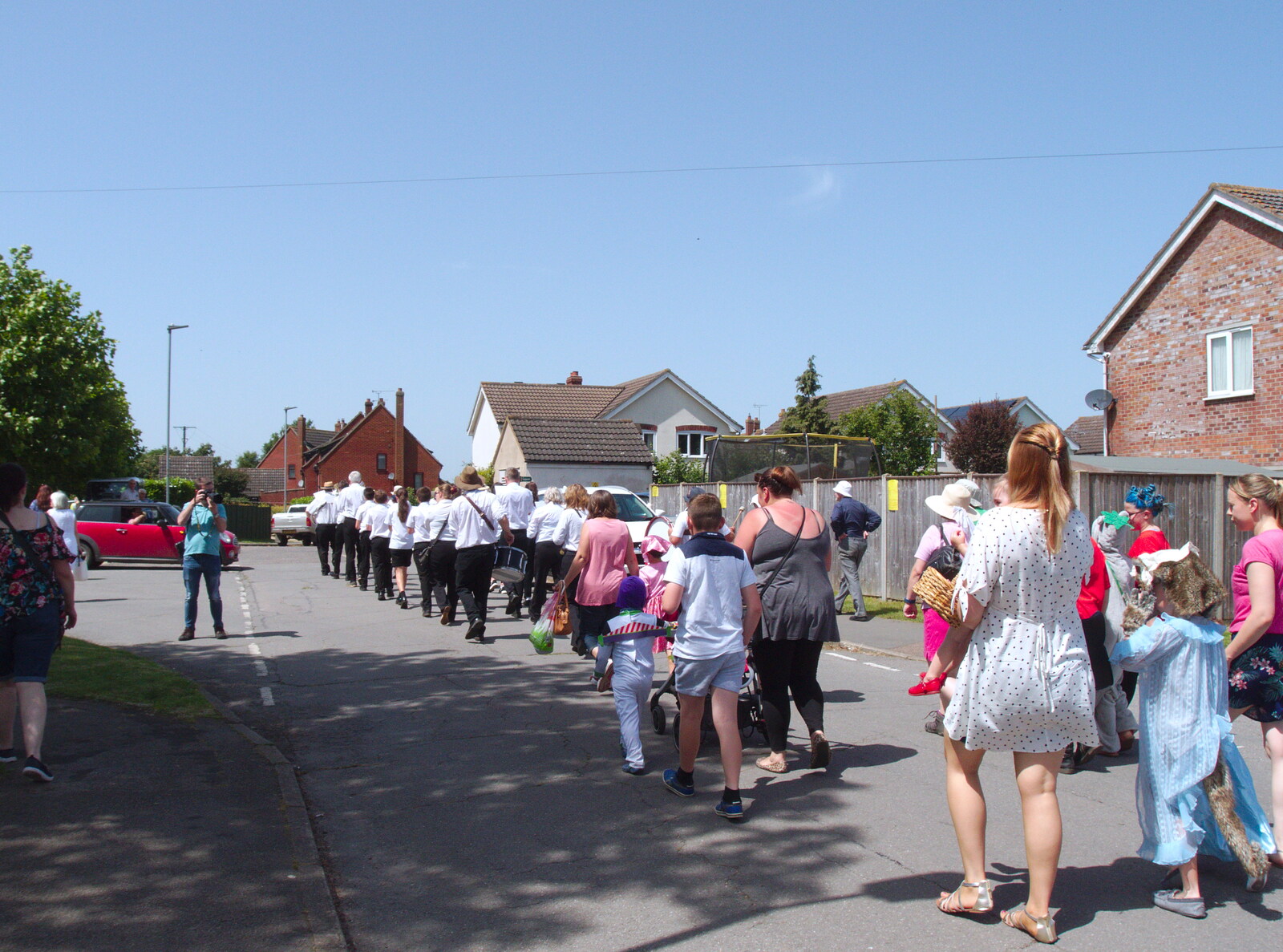 The band marches through the houseing estate from GSB and the Gislingham Fete, Suffolk - 29th June 2019