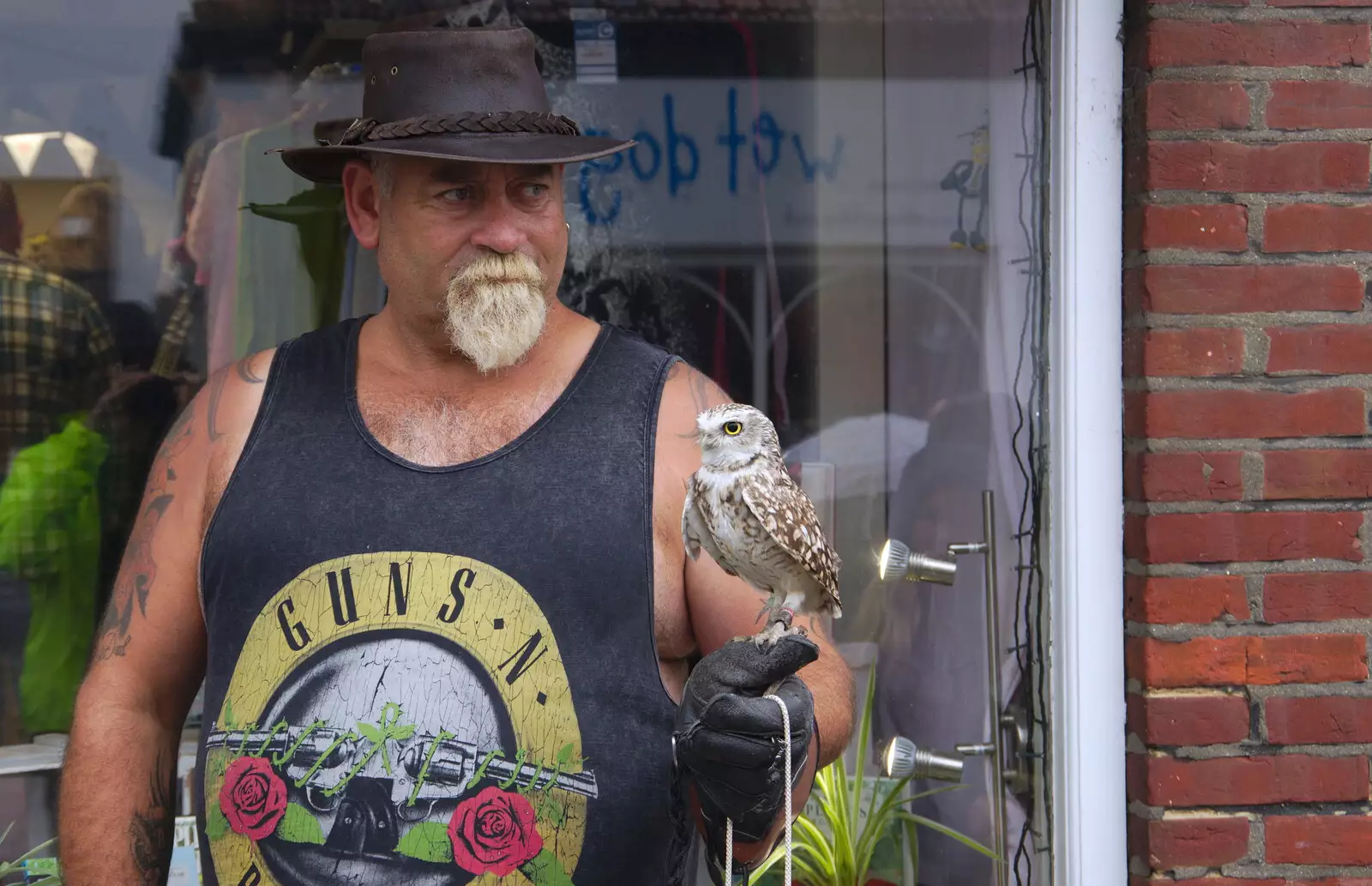 On Fore Street, there's a dude with a small owl, from Kelling Camping and the Potty Morris Festival, Sheringham, North Norfolk - 6th July 2019