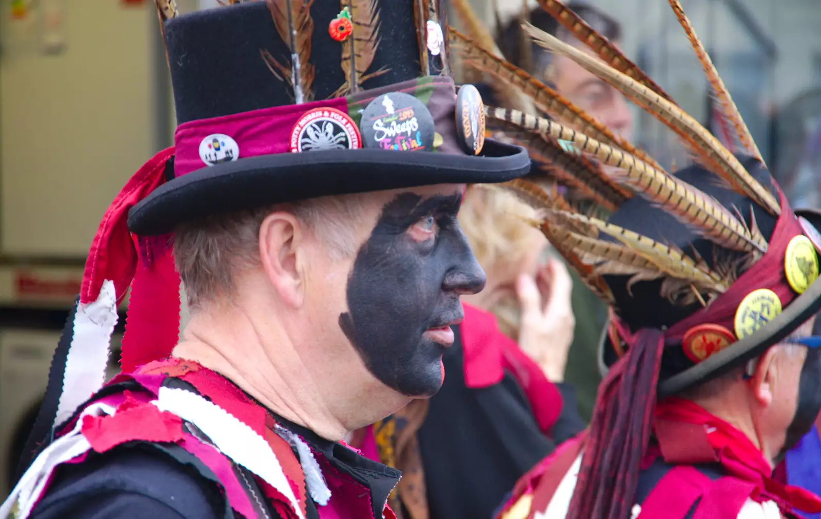 A Morris dancer looks at something, from Kelling Camping and the Potty Morris Festival, Sheringham, North Norfolk - 6th July 2019