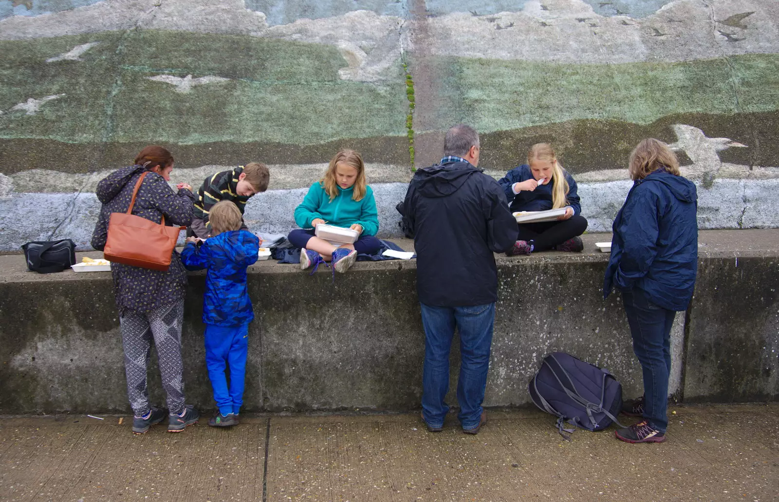 The gang sit on a painted sea wall, from Kelling Camping and the Potty Morris Festival, Sheringham, North Norfolk - 6th July 2019