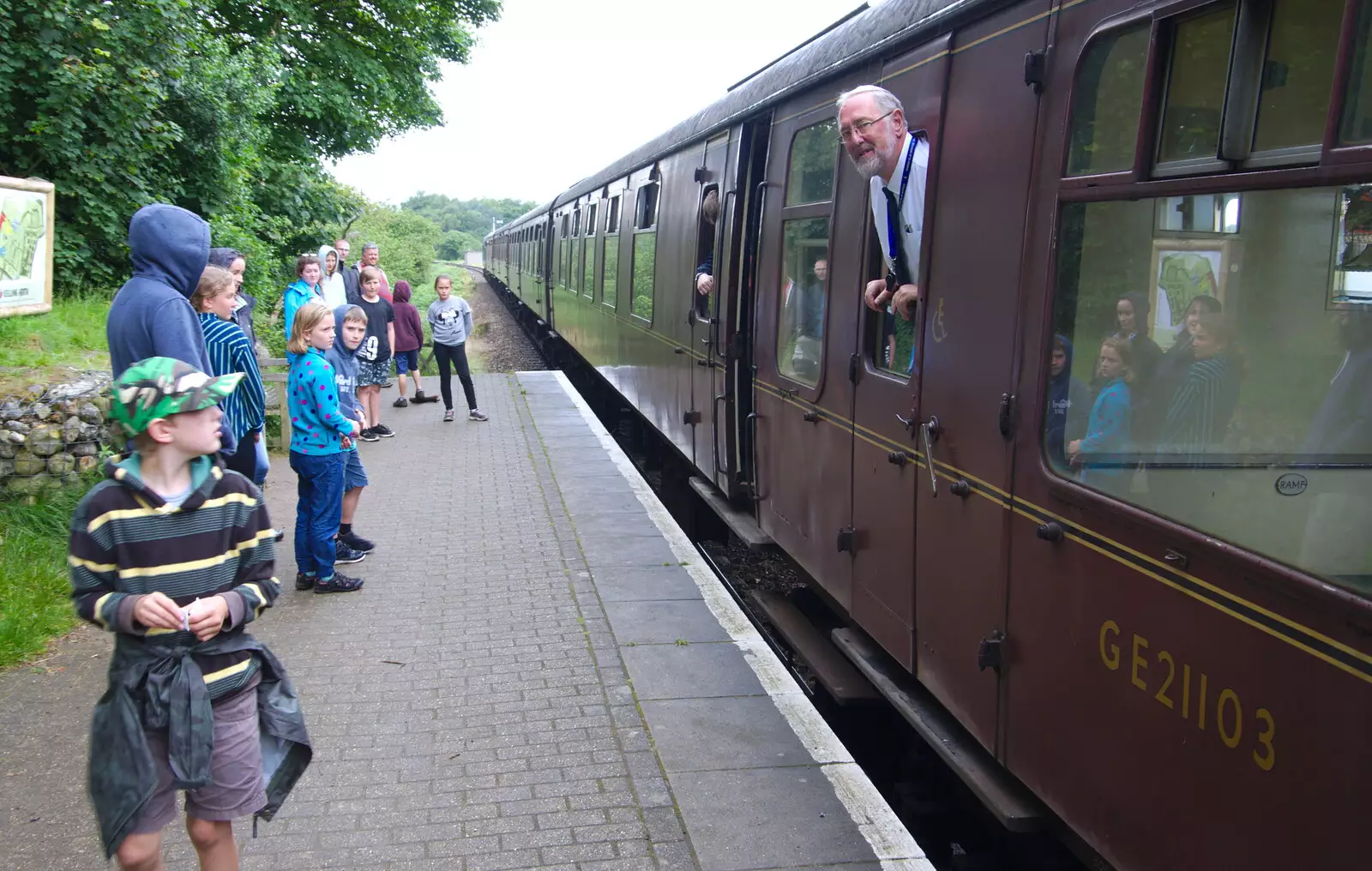 The conductor sees us off at Kelling Heath, from Kelling Camping and the Potty Morris Festival, Sheringham, North Norfolk - 6th July 2019