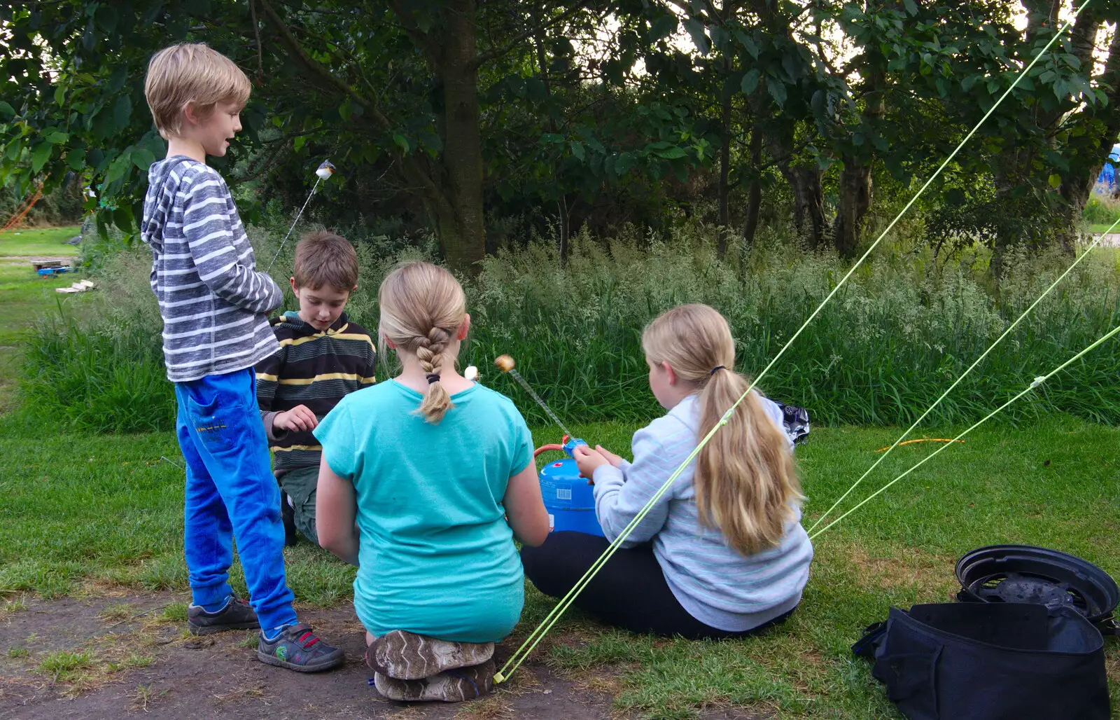 The kids do marshmallows on a stick, from Kelling Camping and the Potty Morris Festival, Sheringham, North Norfolk - 6th July 2019