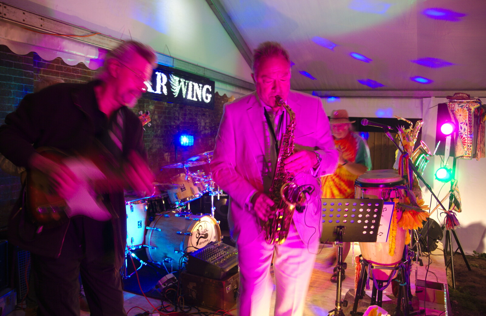 The sax player roams around from The Shakesbeer Festival, Star Wing Brewery, Redgrave, Suffolk - 13th July 2019