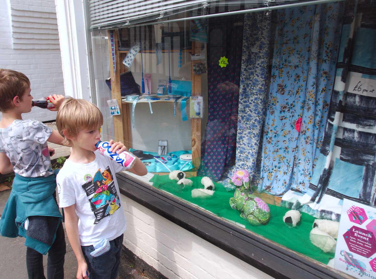The boys look in the window of the fabric shop from The Sheep Trail, Eye, Suffolk - 20th July 2019
