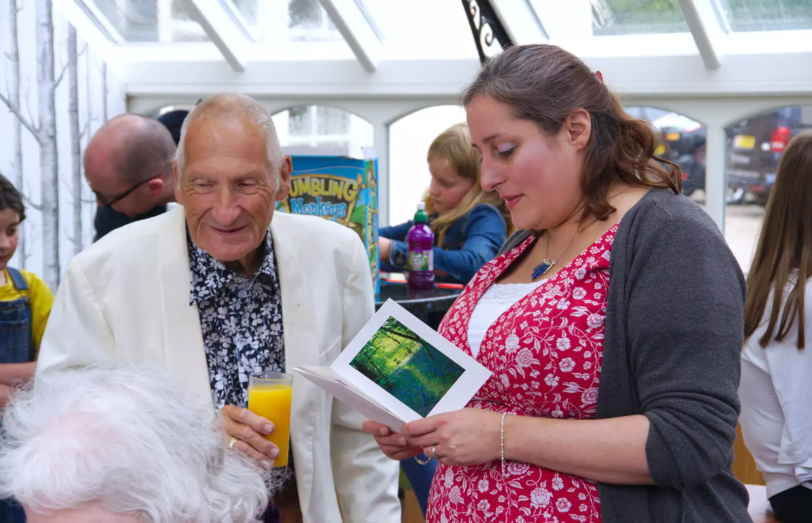 Anita reads a card, from Anita and Alex's Leaving Do, The Oaksmere, Brome, Suffolk - 27th July 2019