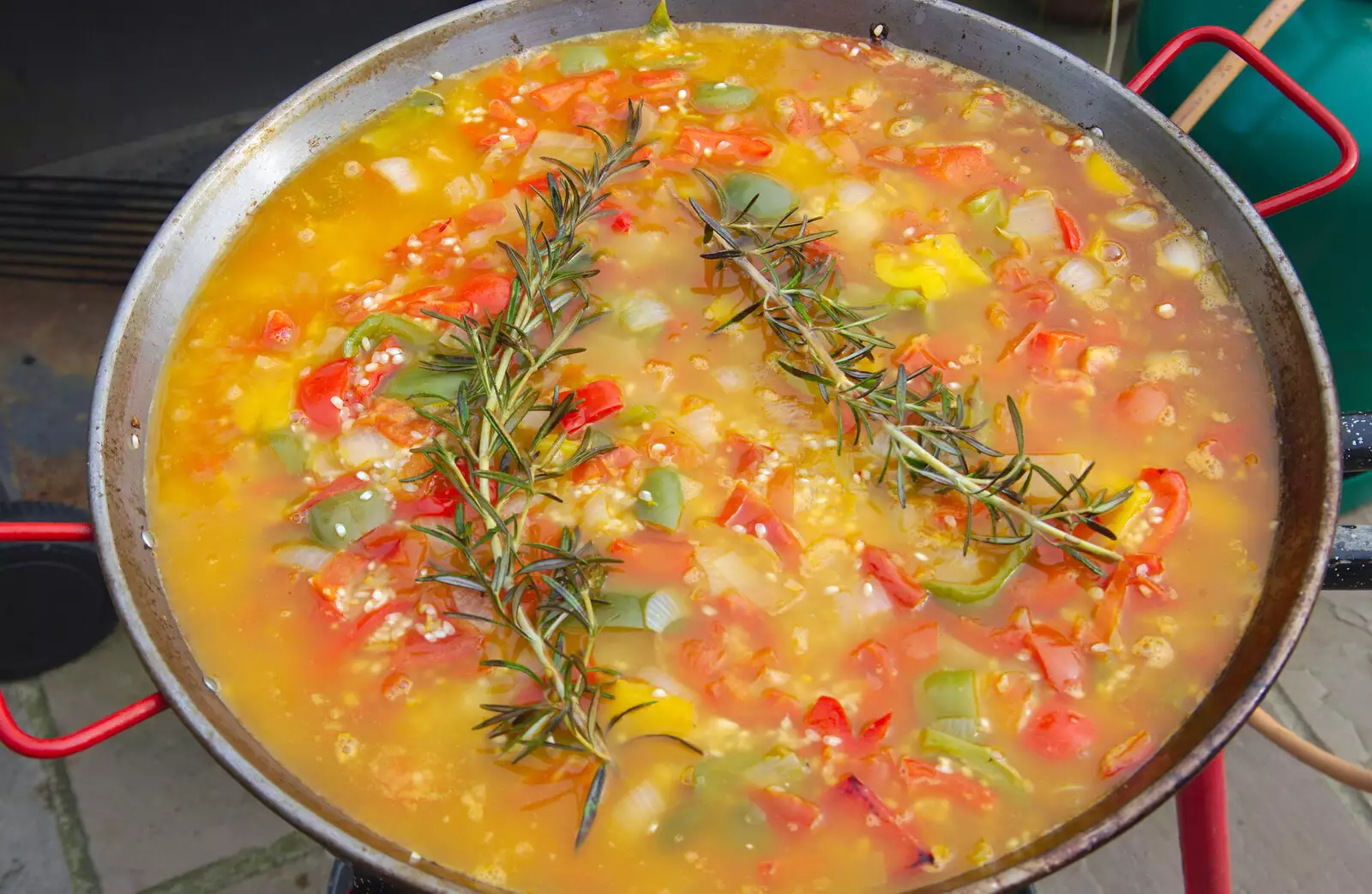 The paella gets some fresh rosemary added, from A Summer Party, Brome, Suffolk - 3rd August 2019