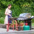 Isobel pokes the paella, A Summer Party, Brome, Suffolk - 3rd August 2019