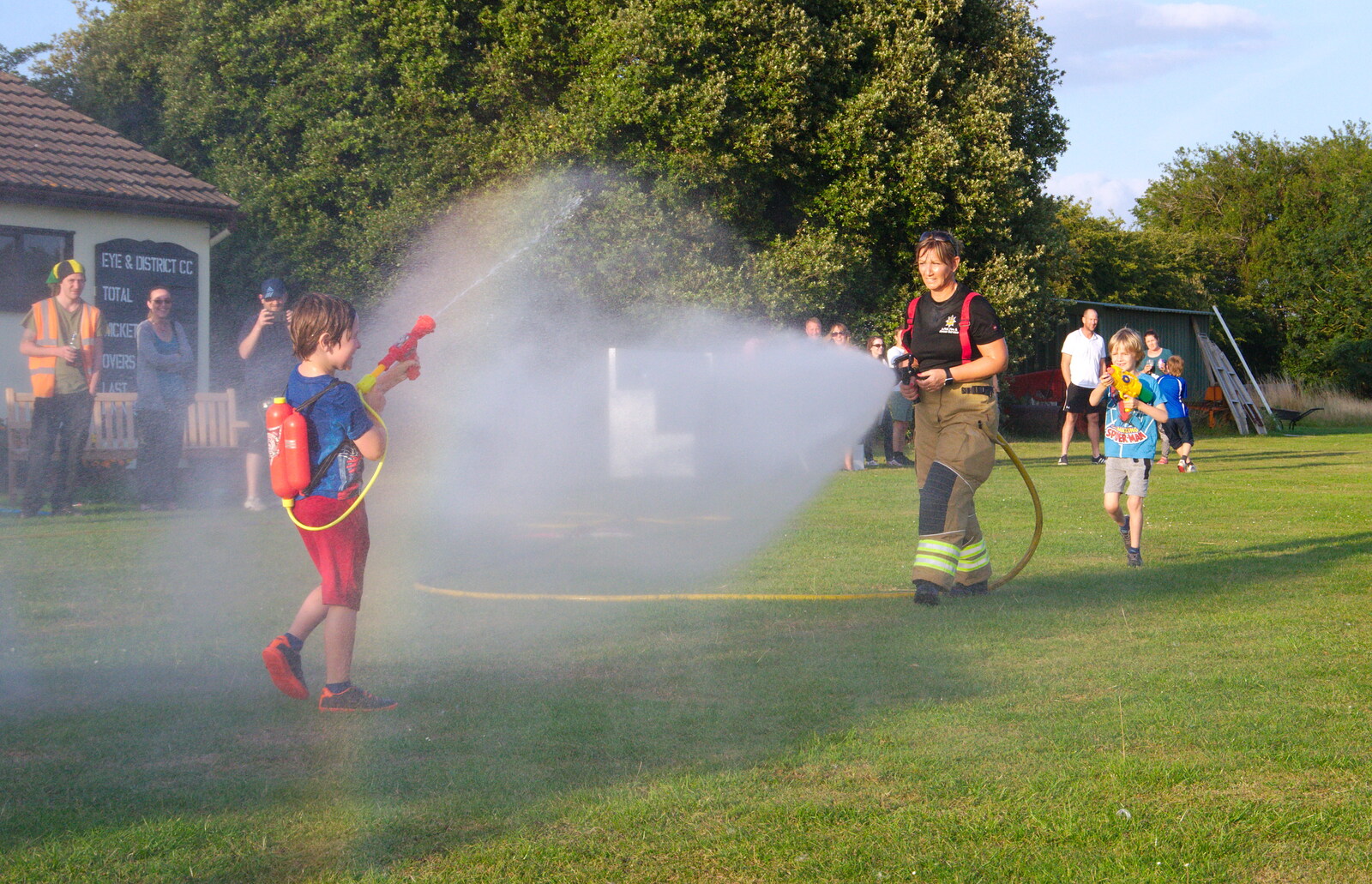 Harry sneaks up from behind from A Water Fight with a Fire Engine, Eye Cricket Club, Suffolk - 5th August 2019