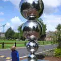 Harry stares up at a big steel ball sculpture, Busking in Temple Bar, Dublin, Ireland - 12th August 2019