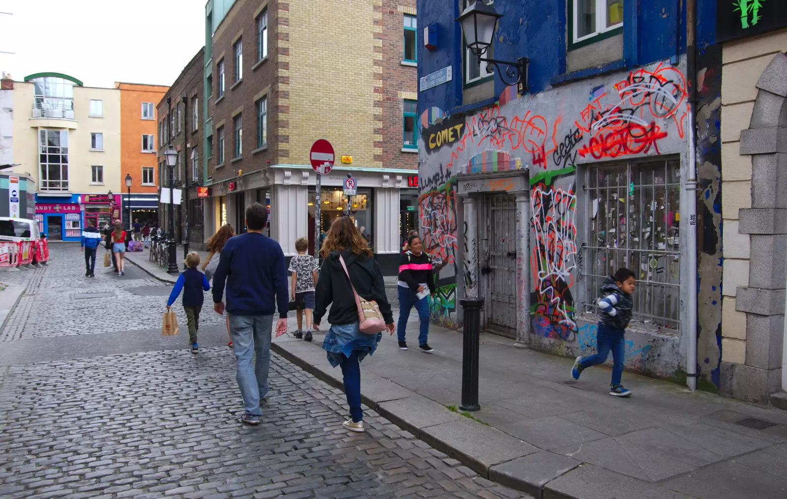 Walking past the graffiti shop, from Busking in Temple Bar, Dublin, Ireland - 12th August 2019