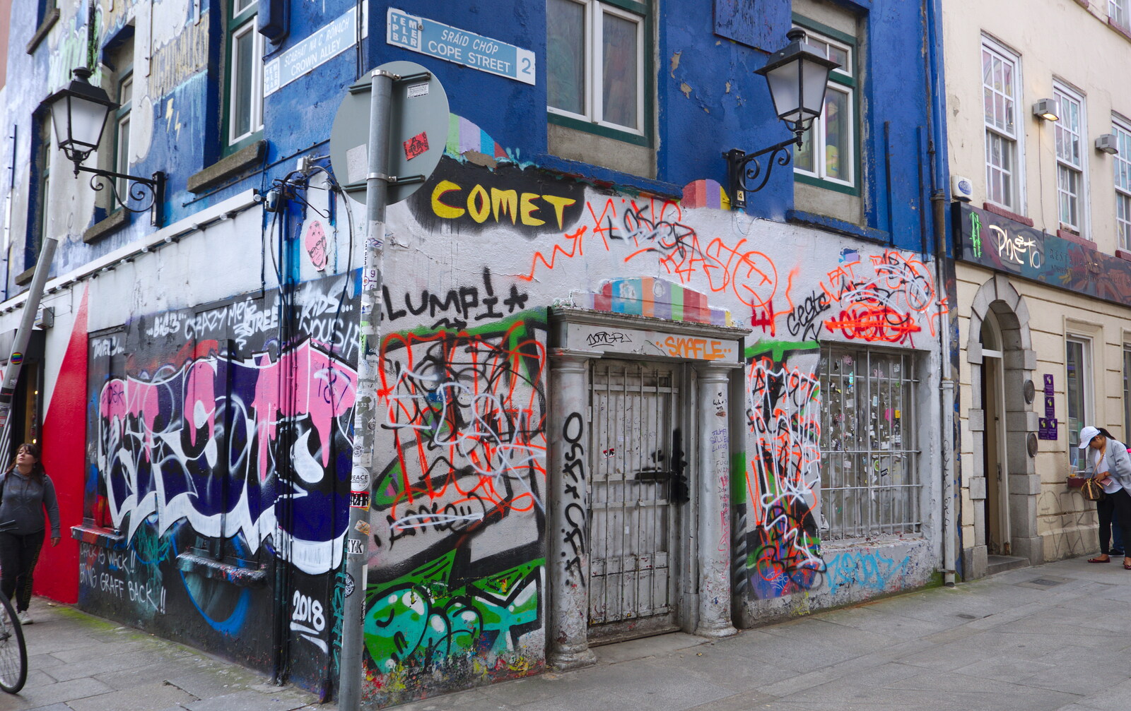 A graffiti-covered shop from Busking in Temple Bar, Dublin, Ireland - 12th August 2019