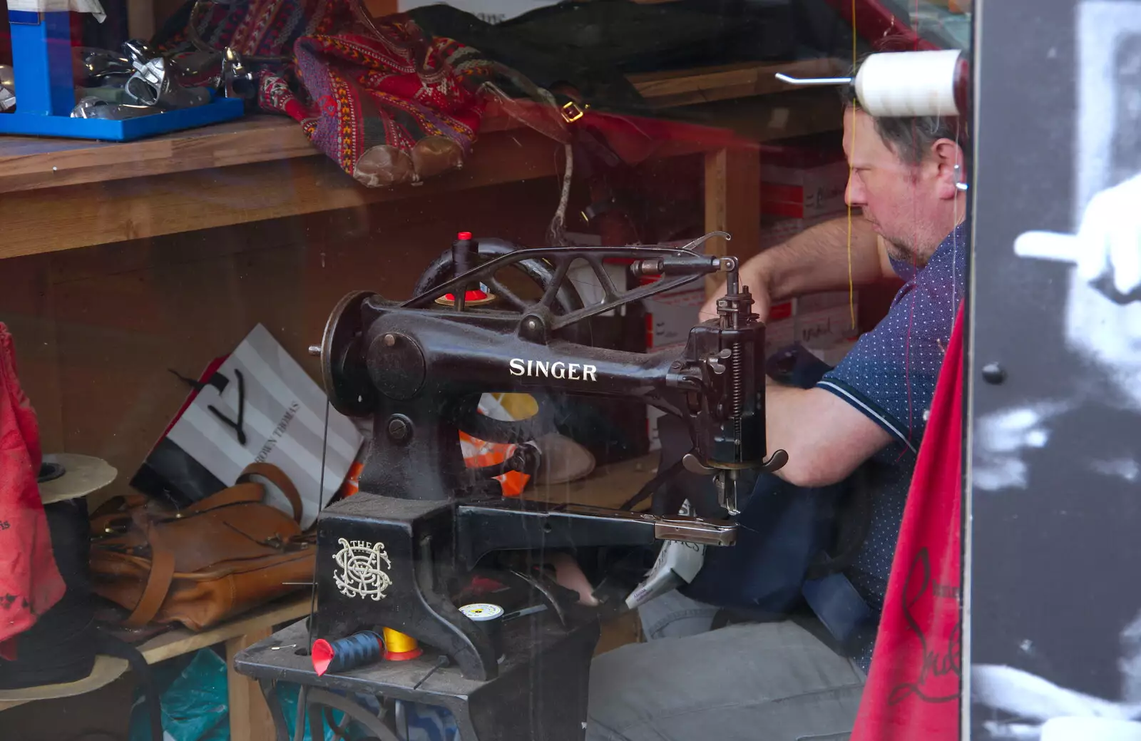 A repair shop with a Singer sewing machine, from Busking in Temple Bar, Dublin, Ireland - 12th August 2019