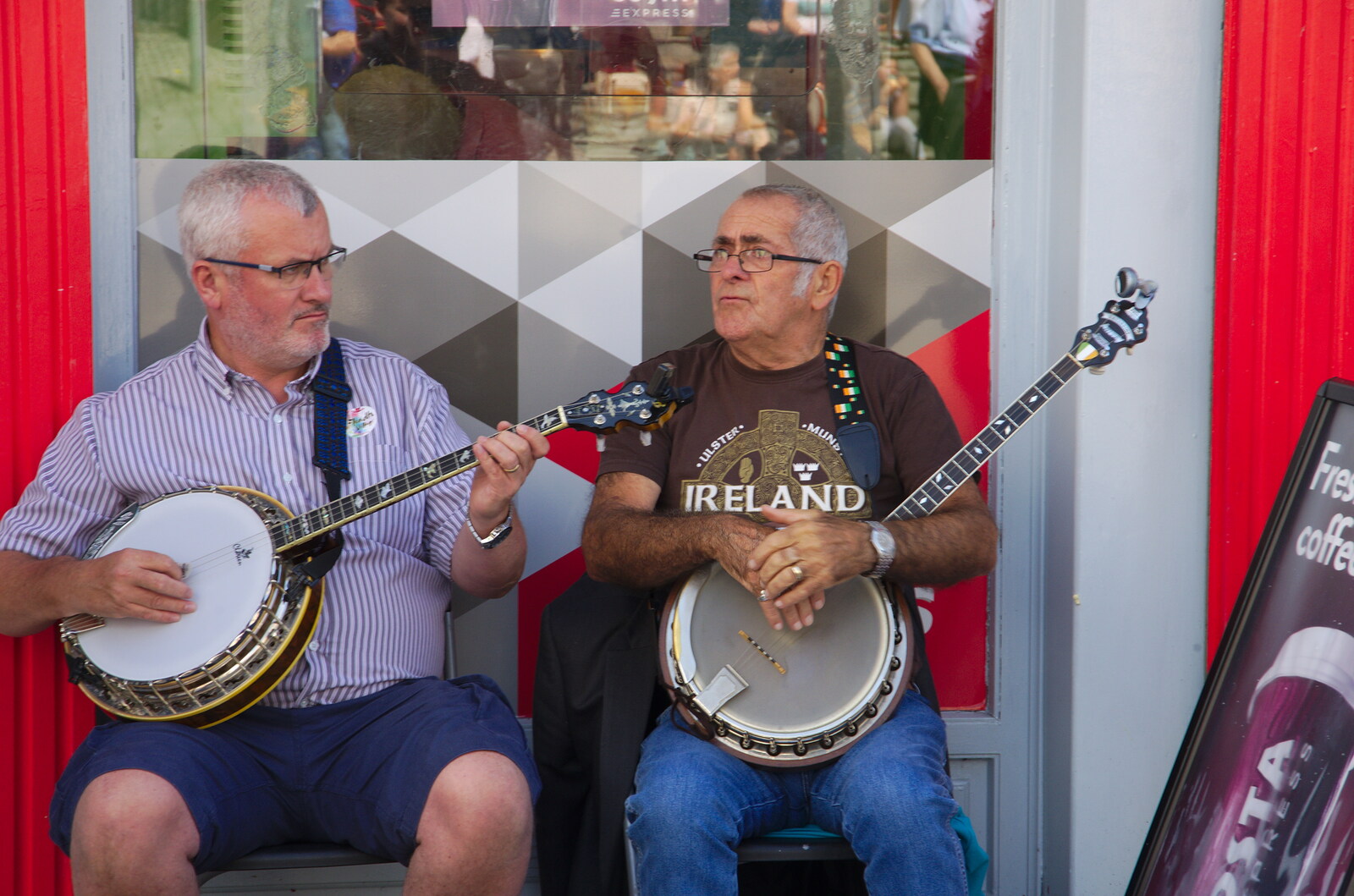 A couple of banjo players from The Fleadh Cheoil na hÉireann, Droichead Átha, Co. Louth, Ireland - 13th August 2019