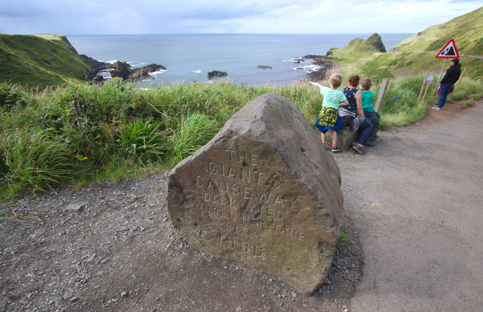 The boulder announcing World Heritage status from The Giant's Causeway, Bushmills, County Antrim, Northern Ireland - 14th August 2019