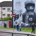 Tourists wander around by the Battle of the Bogside , A Day in Derry, County Londonderry, Northern Ireland - 15th August 2019
