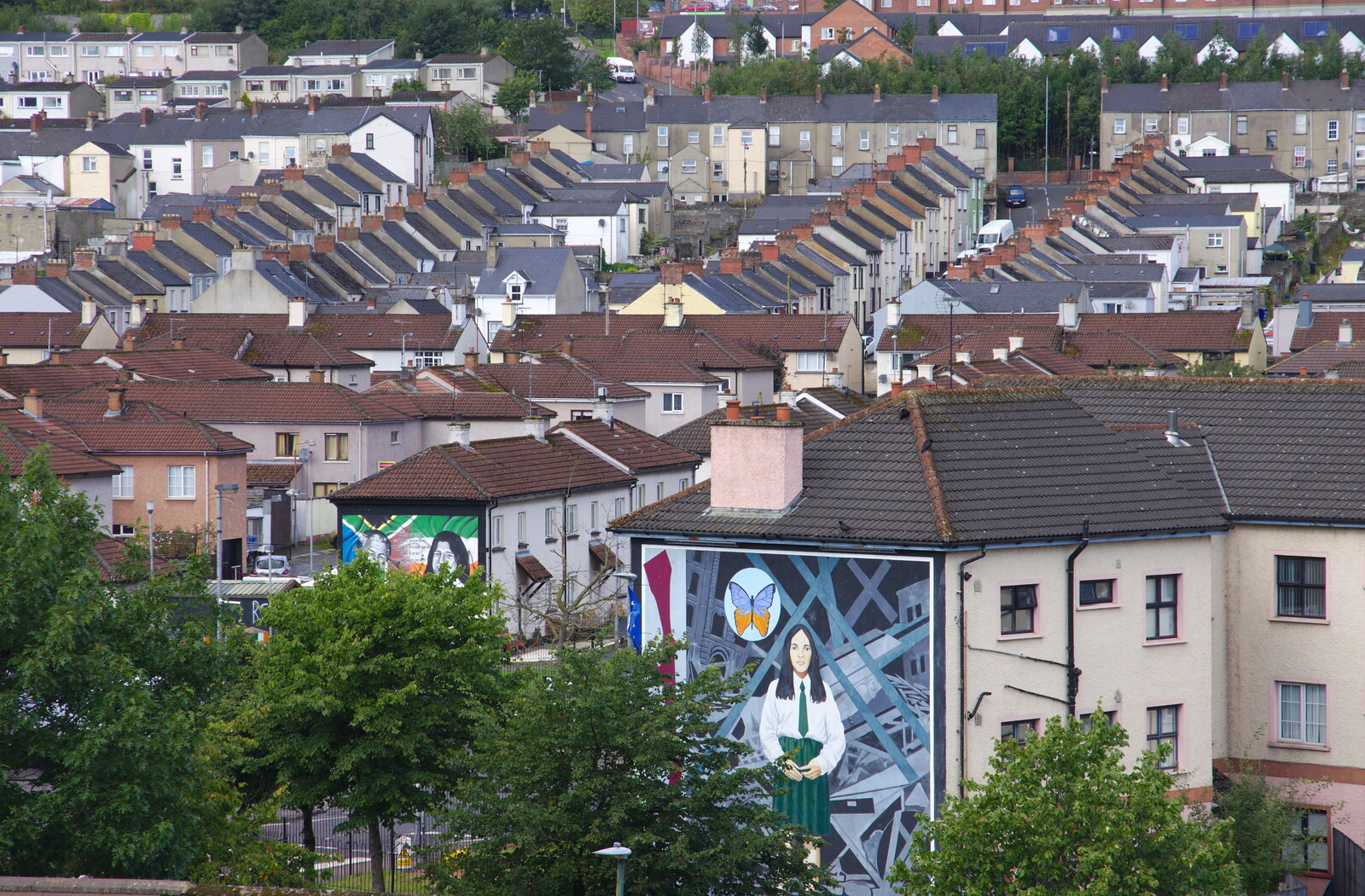 The Bogside Estate, and a Catholic schoolgirl mural from A Day in Derry, County Londonderry, Northern Ireland - 15th August 2019