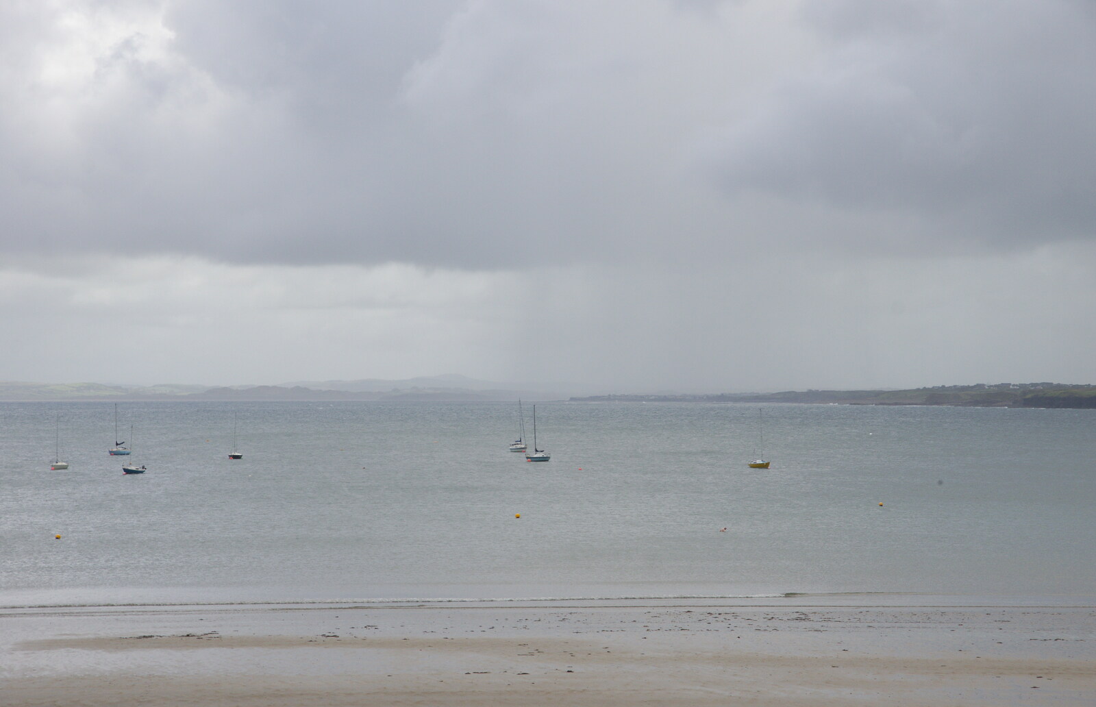 Boats on the sea, with a wall of rain from Mullaghmore Beach and Marble Arch Caves, Sligo and Fermanagh, Ireland - 19th August 2019
