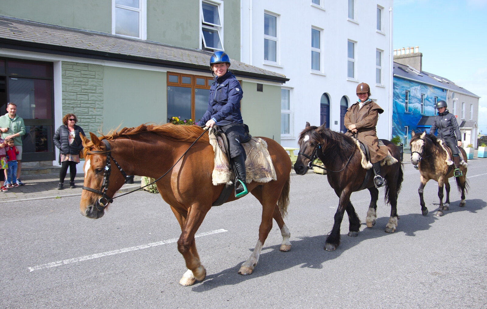 The horses from the beach trot past from Mullaghmore Beach and Marble Arch Caves, Sligo and Fermanagh, Ireland - 19th August 2019