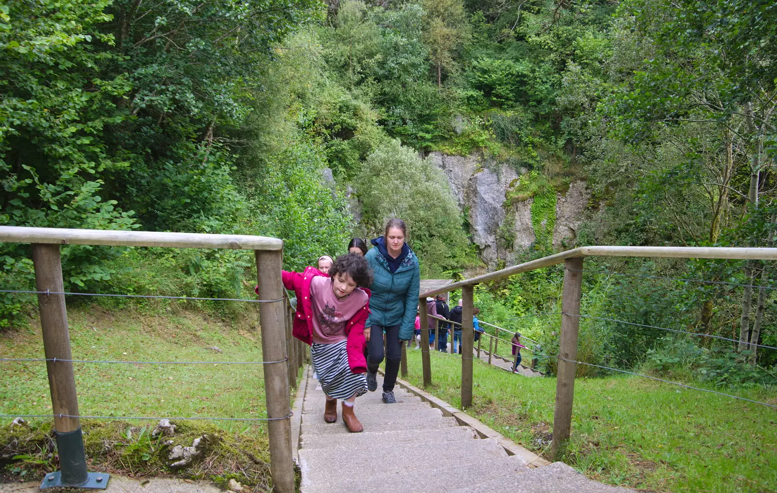 Fern and Isobel climb the steps back out of the pit, from Mullaghmore Beach and Marble Arch Caves, Sligo and Fermanagh, Ireland - 19th August 2019