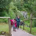 Fern and Isobel climb the steps back out of the pit, Mullaghmore Beach and Marble Arch Caves, Sligo and Fermanagh, Ireland - 19th August 2019