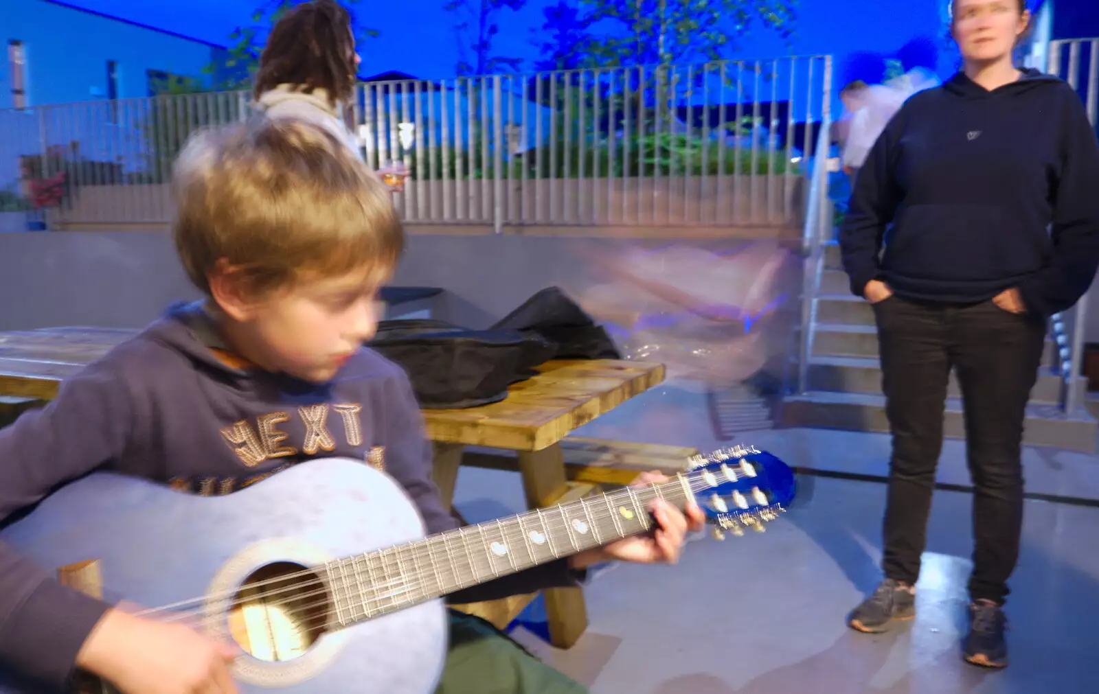 Fred plays guitar as Isobel looks on, from Mullaghmore Beach and Marble Arch Caves, Sligo and Fermanagh, Ireland - 19th August 2019