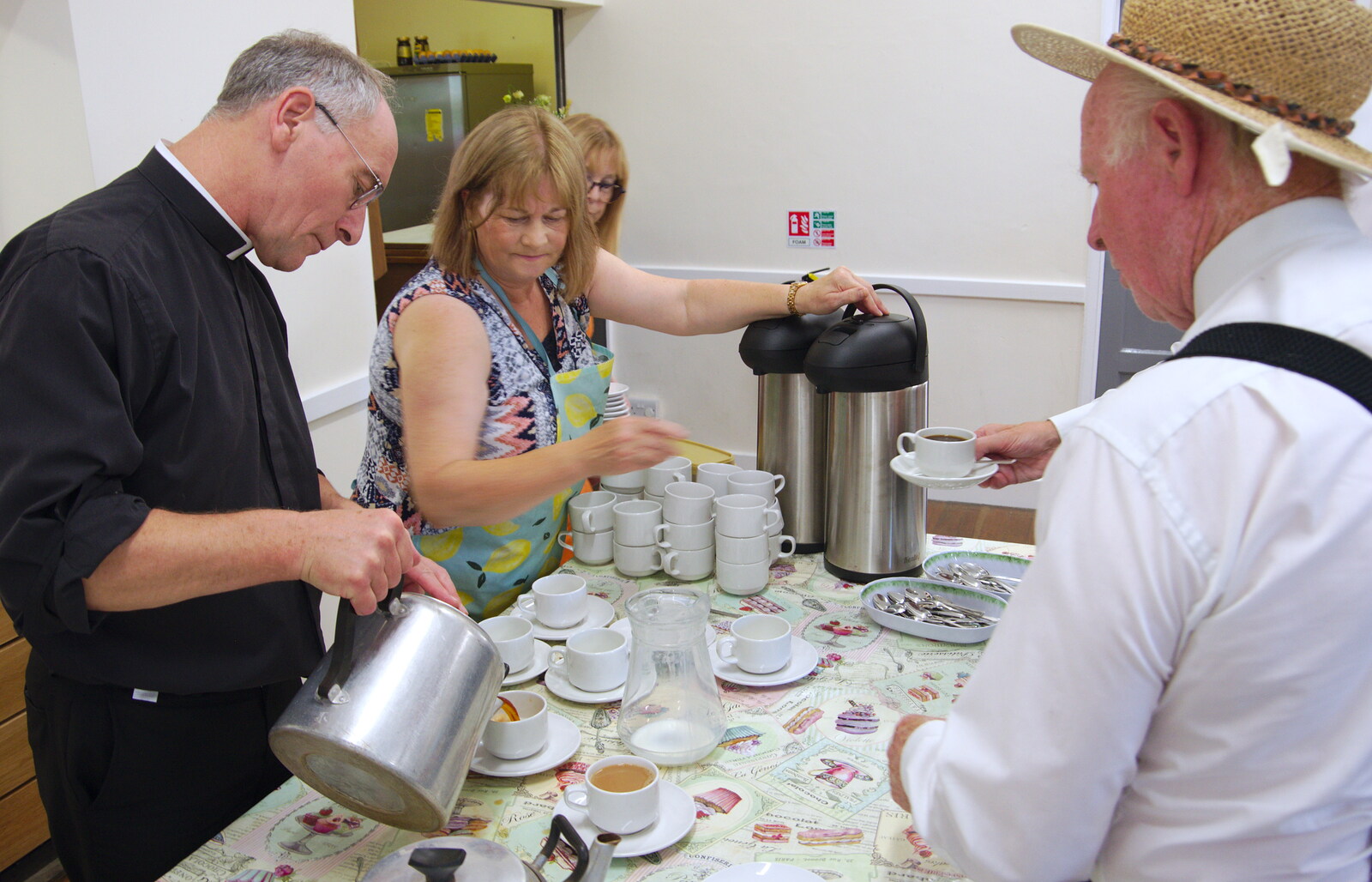It's pure summer fete: the vicar serves up tea from The Gislingham Silver Band at Walsham Le Willows, Suffolk - 26th August 2019